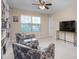 Bright bonus room featuring neutral walls and two chairs, creating a relaxing atmosphere at 839 Old Towne Dr, Elon, NC 27244