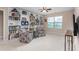Bonus room boasting built-in bookshelves, offering ample storage and display space at 839 Old Towne Dr, Elon, NC 27244
