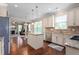 Light and bright eat-in kitchen has granite counters, an island, and stainless appliances at 839 Old Towne Dr, Elon, NC 27244
