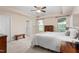 Spacious main bedroom boasts neutral walls, tray ceiling, carpeted floors, and natural light at 839 Old Towne Dr, Elon, NC 27244