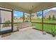 Inviting screened porch with a swing and views of the landscaped backyard at 839 Old Towne Dr, Elon, NC 27244