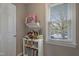 Cozy bedroom featuring a window with a view and playful decorations to create an inviting space at 8608 Cheerful Ct, Raleigh, NC 27615