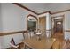 Traditional dining room featuring wooden trim, table, and chairs offers classic charm at 8608 Cheerful Ct, Raleigh, NC 27615