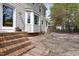 Charming home featuring backyard patio area and lush landscaping at 8608 Cheerful Ct, Raleigh, NC 27615
