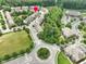 Aerial view of the neighborhood, with its lush greenery, and the home's convenient location at 8722 Macedonia Lake Dr, Cary, NC 27518