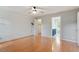 Open bedroom features hardwood floors and an ensuite bathroom at 912 Salem Woods Dr, Raleigh, NC 27615