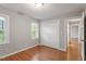 Bedroom features hardwood floors, natural light and a closet at 912 Salem Woods Dr, Raleigh, NC 27615