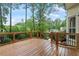 Wooden deck featuring wood railing and views of wooded lot at 912 Salem Woods Dr, Raleigh, NC 27615