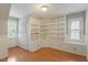 Office with custom built-in shelving and cabinets offers ample storage at 912 Salem Woods Dr, Raleigh, NC 27615
