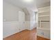 This room features a door, a built-in bookcase and natural light at 912 Salem Woods Dr, Raleigh, NC 27615