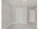 Bedroom features carpeted floors, and two white doors at 1005 Barmkin Pl, Knightdale, NC 27545