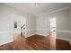 Elegant dining room with hardwood floors, neutral walls, and open access to other rooms at 1005 Barmkin Pl, Knightdale, NC 27545