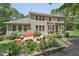 Inviting backyard featuring a cozy patio with outdoor seating and a well-maintained lawn at 1009 Blue Larkspur Ave, Wake Forest, NC 27587