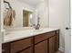 Bathroom boasts an expansive countertop, well-lit mirror, and ample storage at 1009 Blue Larkspur Ave, Wake Forest, NC 27587