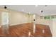 Large bonus room featuring hardwood flooring, neutral walls, multiple windows, and recessed lighting at 1009 Blue Larkspur Ave, Wake Forest, NC 27587