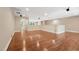Large bonus room featuring hardwood floors, neutral paint, and recessed lights at 1009 Blue Larkspur Ave, Wake Forest, NC 27587