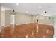 Spacious bonus room with hardwood floors, neutral walls, and recessed lighting at 1009 Blue Larkspur Ave, Wake Forest, NC 27587