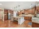 Spacious kitchen with granite countertops, a large island, and stainless appliances at 1009 Blue Larkspur Ave, Wake Forest, NC 27587