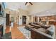 Spacious open-concept living room and kitchen with hardwood floors at 1009 Blue Larkspur Ave, Wake Forest, NC 27587