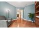 Bright office featuring a chair, built-in shelves and natural light at 1009 Blue Larkspur Ave, Wake Forest, NC 27587