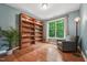 Comfortable office space with custom built-ins, natural light, and hardwood floors at 1009 Blue Larkspur Ave, Wake Forest, NC 27587