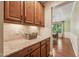 Pantry with wooden cabinetry and countertop space at 1009 Blue Larkspur Ave, Wake Forest, NC 27587