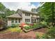 Beautiful home with a spacious backyard, screened-in porch, and an inviting outdoor patio at 1009 Blue Larkspur Ave, Wake Forest, NC 27587