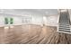 Finished basement features stylish flooring, bright lighting, and walkout access to the backyard at 1030 Steinbeck Dr, Durham, NC 27703
