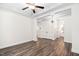 Spacious bedroom includes wood-look floors, ample closet space, and access to an en-suite bathroom at 1030 Steinbeck Dr, Durham, NC 27703