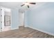 Light blue bedroom with bathroom and closet at 1030 Steinbeck Dr, Durham, NC 27703