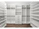 Spacious walk-in closet with custom shelving and ample storage space at 1030 Steinbeck Dr, Durham, NC 27703
