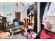 Cluttered bedroom, lots of yarn and boots at 110 E Church St, Creedmoor, NC 27522