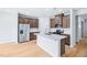 Modern kitchen featuring an island, stainless steel appliances, and ample cabinet space at 1105 Landen Creek Ln, Zebulon, NC 27597