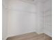 Walk-in closet with wire shelving and wood-look floor at 114 Hays St, Oxford, NC 27565