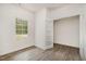 Bright study featuring light wood floors, a window, and glass paneled doors at 114 Hays St, Oxford, NC 27565