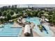 Aerial view of Amberly's community pool, water park and surrounding residential buildings at 1206 Chalk Maple Dr, Cary, NC 27519