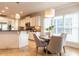 Bright kitchen and dining area with hardwood floors and stainless appliances at 1206 Chalk Maple Dr, Cary, NC 27519