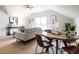 Open-concept living space with a dining area and plenty of natural light at 1206 Chalk Maple Dr, Cary, NC 27519