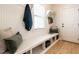 Cozy mudroom with built-in bench, storage cubbies, and natural light at 1206 Chalk Maple Dr, Cary, NC 27519