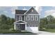 Charming two-story home with a gray exterior, stone accents, and an attached two-car garage at 1224 Coral Cay Bnd, Wake Forest, NC 27587