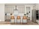 Kitchen featuring an island with seating, pendant lighting, stainless steel appliances, and ample cabinet space at 1224 Coral Cay Bnd, Wake Forest, NC 27587