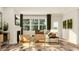 Bright living room with stylish furniture, a modern fireplace, and plenty of natural light at 1224 Coral Cay Bnd, Wake Forest, NC 27587
