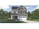 Charming two-story home featuring a stylish facade, a two-car garage, and manicured landscaping at 1228 Coral Cay Bnd, Wake Forest, NC 27587