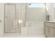 Bathroom featuring a tiled shower, soaking tub, modern fixtures, and updated vanity at 1232 Coral Cay Bnd, Wake Forest, NC 27587
