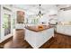 Gourmet kitchen with large island, modern appliances, and stylish finishes at 12424 Beauvoir St, Raleigh, NC 27614