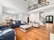 Spacious open concept living area with hardwood floors and lots of natural light at 12424 Beauvoir St, Raleigh, NC 27614