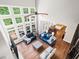 Bright living room boasts hardwood floors, large windows, and comfortable seating at 12424 Beauvoir St, Raleigh, NC 27614