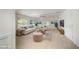 Bonus room with soft decor, plush seating, and bright natural light at 1401 Brewer Jackson Ct, Wake Forest, NC 27587