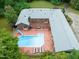 Overhead view of private backyard retreat with pool and mature landscaping at 1514 Lawrence Rd, Creedmoor, NC 27522