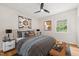 Comfortable bedroom with neutral tones, a large window, and stylish furnishings at 1514 Lawrence Rd, Creedmoor, NC 27522